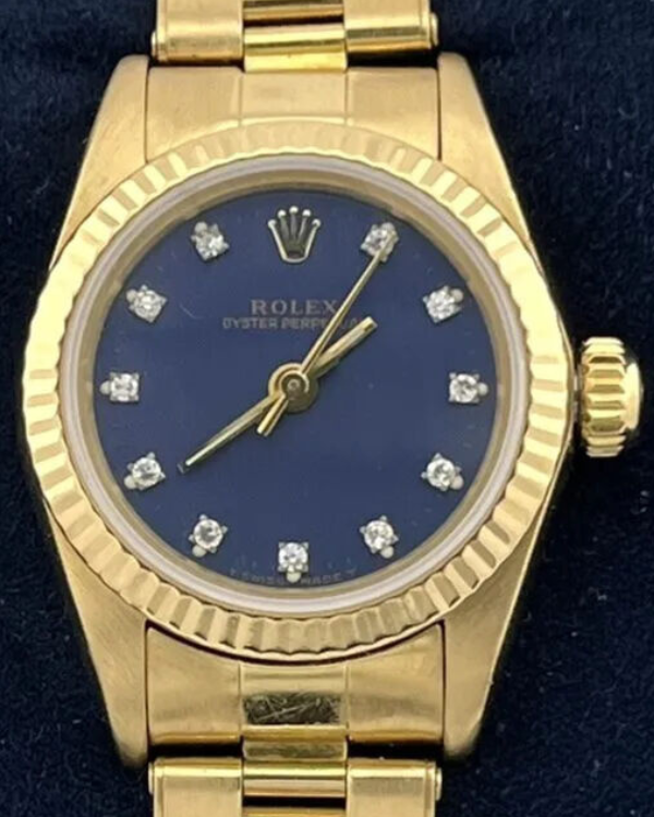 1985 (8.7 Million Serial)  Rolex Oyster Perpetual Vintage 24MM Blue Dial Yellow Gold Bracelet (67198)