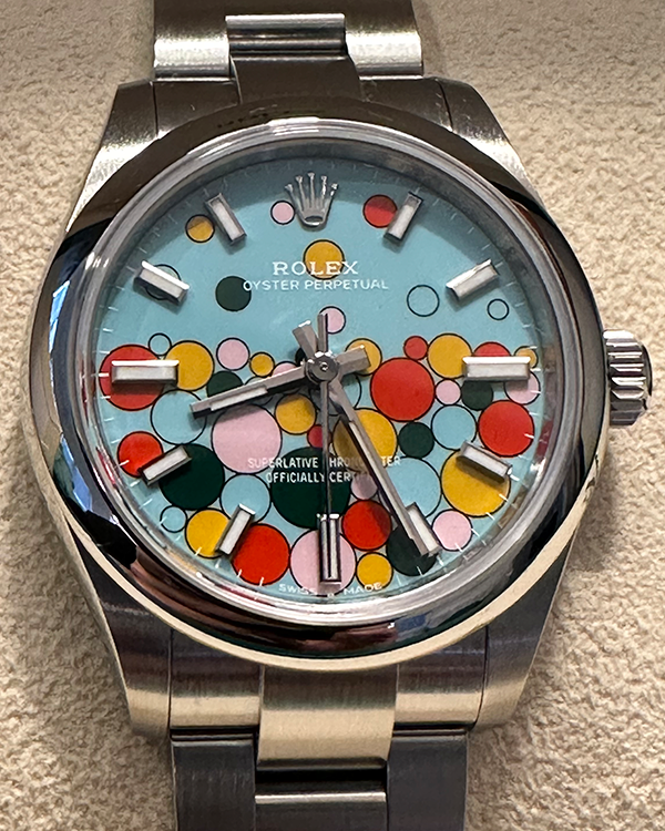 2023 Rolex Oyster Perpetual 31MM Turquoise Blue "Celebration" Motif Dial (277200)