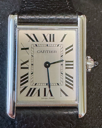 Cartier Tank Must 33.7x25.5MM Quartz Silver Dial Leather Strap (WSTA0041)