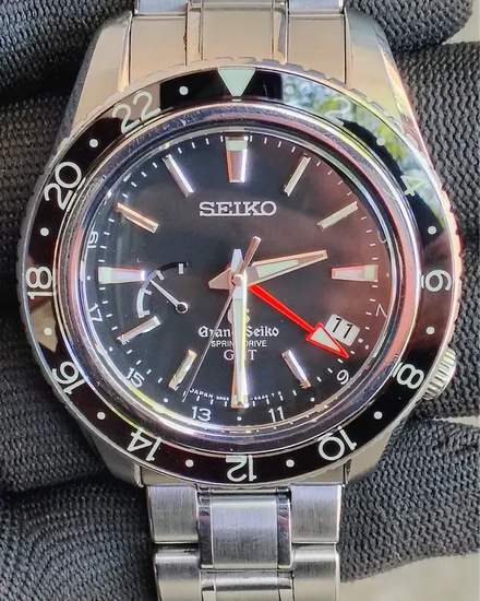 Grand Seiko Sport GMT 44MM Black Dial Steel Bracelet (SBGE001)