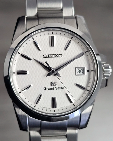 2013 Grand Seiko Heritage Collection 36MM Quartz Silver Dial Steel Bracelet (SBGX053)