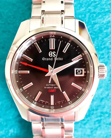 Grand Seiko Heritage Hi-Beat GMT 40MM Black Dial Steel Bracelet (SBGJ203)