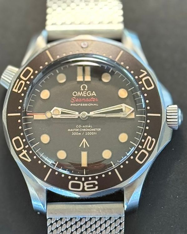 2023 Omega Seamaster Diver 300M "007 No Time To Die" 42MM Brown Dial Titanium Bracelet (210.90.42.20.01.001)
