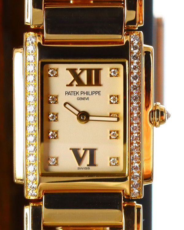 Patek Philippe Twenty-4 26.3MM Quartz Ivory Dial Rose Gold Bracelet (4908/11R-011)