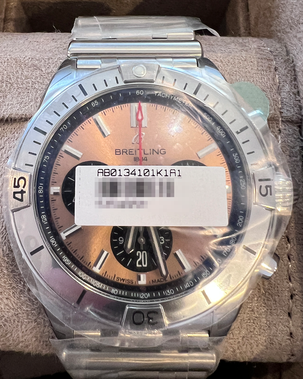 Breitling Chronomat B01 42MM Salmon Dial Steel Bracelet (AB0134101K1A1)