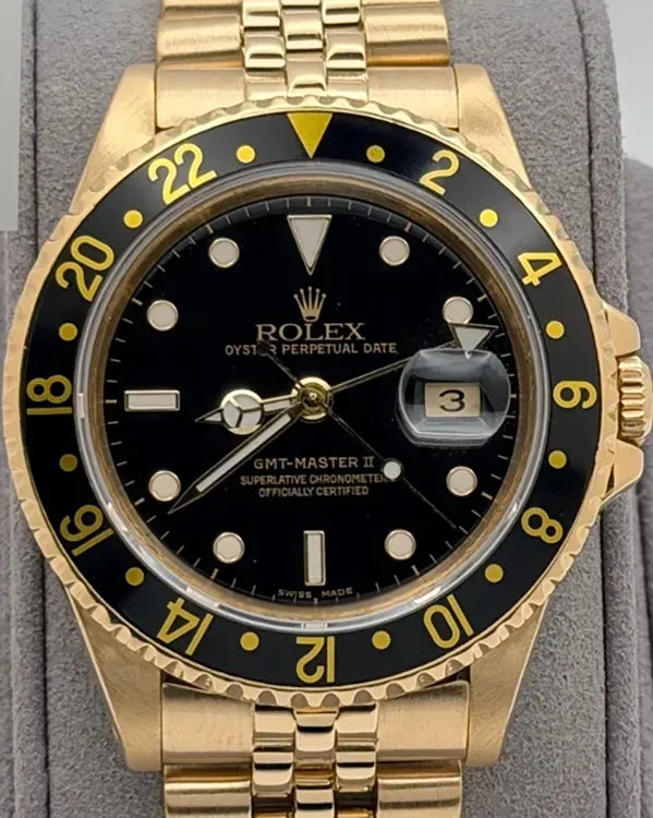 1990 Rolex GMT-Master II 40MM Black Dial Yellow Gold Jubilee Bracelet (16718)