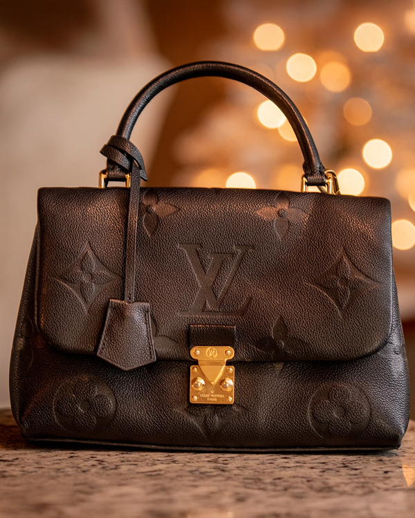 Louis Vuitton Madeleine MM 7.6 x 11.8IN Leather Steel Hardware Leather Strap (MM)