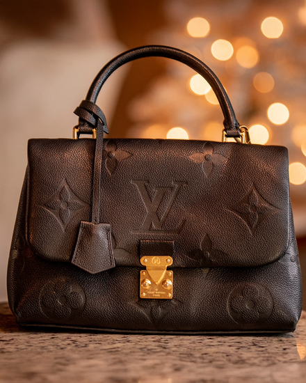 Louis Vuitton Madeleine MM 7.6 x 11.8IN Leather Steel Hardware Leather Strap (MM)