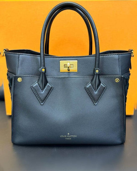 2011 Louis Vuitton On My Side 9.6 x 12 x 5.5IN Leather Gold-Color Hardware Leather Strap (On My Side MM M53826)