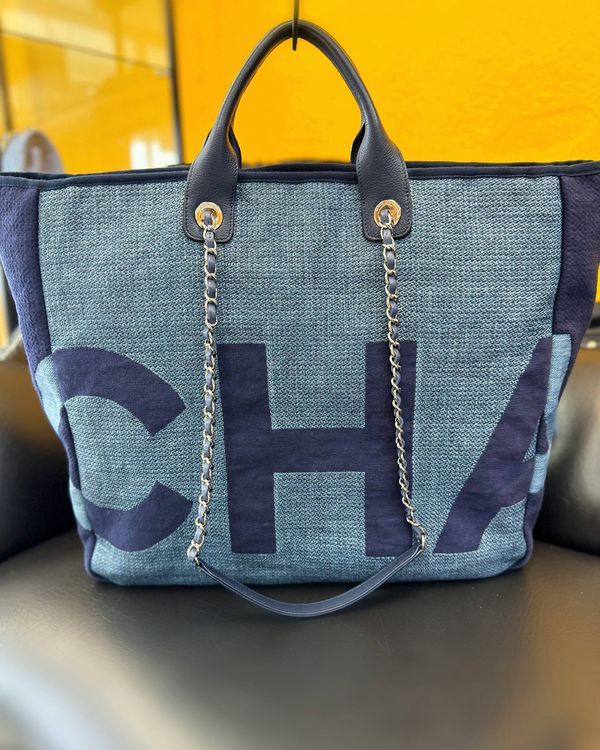Chanel Denim Deauville Logo Shopping Tote 16.5 x 20.75 x 6IN Denim Silver-Tone Hardware Chain Strap (Denim Deauville)