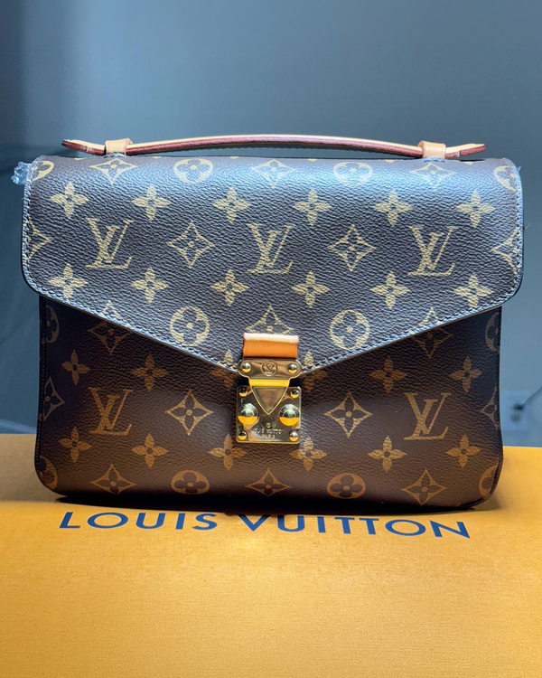Louis Vuitton Liv Pochette Métis 9.8 x 7.5 x 2.8IN Monogram Canvas Leather Gold-Tone Hardware Leather Strap (M44875)