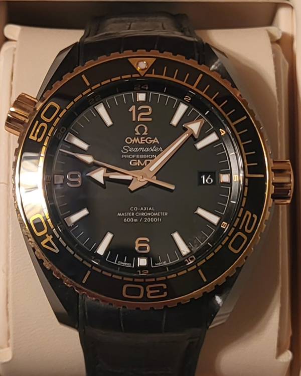 Omega Seamaster Planet Ocean GMT 600M "Deep Black" 18k Sedna Gold 45.5MM Black Dial Leather Strap (215.63.46.22.01.001)