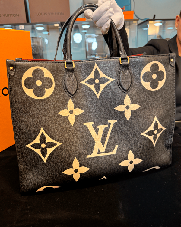 Louis Vuitton Neverfull OnTheGo MM Bicolor Monogram Empreinte Leather 13.5 x 5.5 x 5IN Leather Gold-Toned Hardware Leather Strap (M45495)