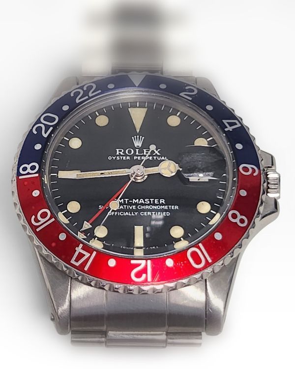 Rolex GMT-Master “Pepsi” 40mm Black Dial Jubilee Bracelet (1675)