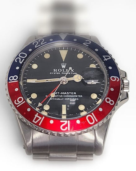 Rolex GMT-Master “Pepsi” 40mm Black Dial Jubilee Bracelet (1675)