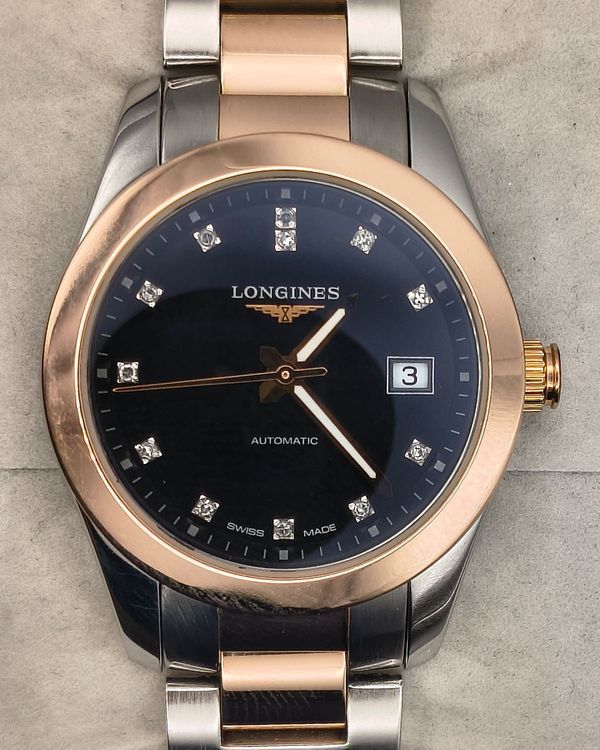 Longines Conquest 29.5 MM Black Dial Dual Tone Bracelet (L2.285.5)