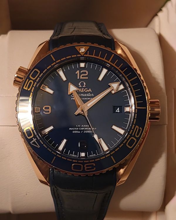 2018 Omega Seamaster Planet Ocean 600M 18K Sedna Gold 43.5MM Blue Dial Leather/Rubber Strap (215.63.44.21.03.001)