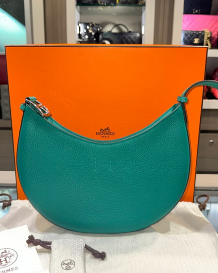 2024 Hermès Accessories P'tit Arcon Togo 9.8 x 6.7 x 3.1IN Leather Palladium Hardware Leather Strap (P'tit Arcon)