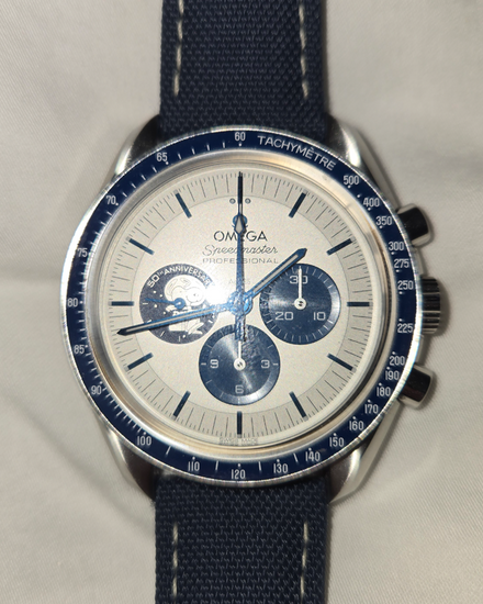 2025 Omega Speedmaster Anniversary Series “Silver Snoopy Award” 42MM Silver Dial Textile Strap (310.32.42.50.02.001)