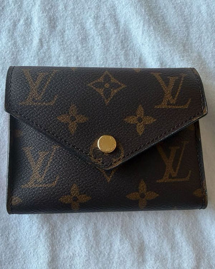 Louis Vuitton Monogram Victorine Wallet 4.7 x 3.7 x 1IN Canvas Gold-Tone Hardware (Victorine)