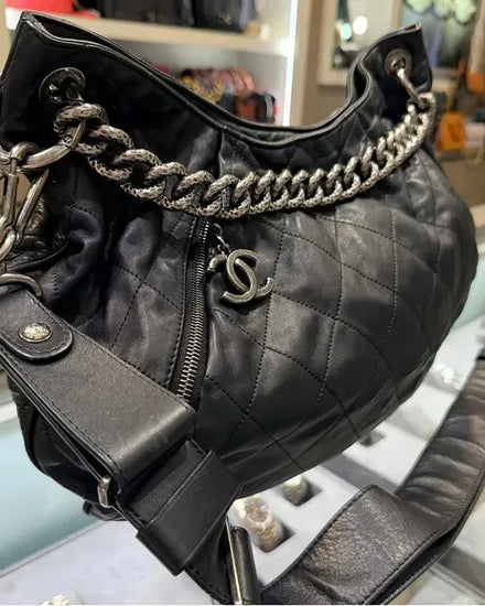 2012 Chanel Large Coco Pleats Hobo Black Distressed Calfskin Shoulder Bag 15.75 × 10.75 × 0.75IN Leather Silver-Tone Hardware Leather Strap (Coco Pleats)