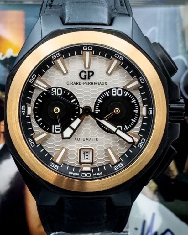 Girard Perregaux Chronograph Hollywoodland 44MM Silver "Honeycomb" Dial Leather Strap (49970-34-232-BB6A)
