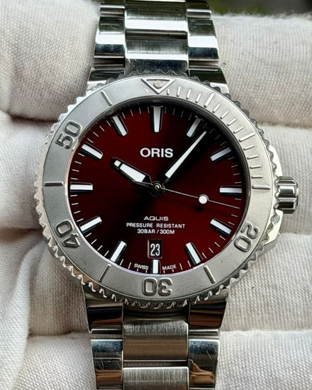 2022 Oris Aquis Date Relief 41.5MM Red Dial Steel Bracelet (01 733 7766 4158-07 8 22 05PEB)