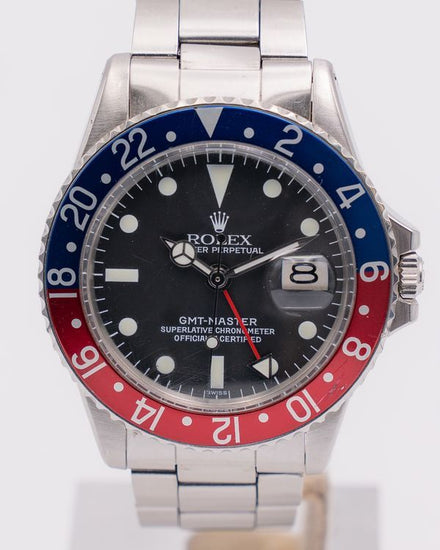 Rolex GMT-Master "Pepsi" 40MM Black "Swiss Only" Dial Oyster Bracelet (1675)