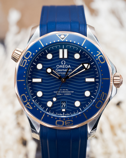 2024 Omega Seamaster Diver 300M Sedna Gold 42MM Blue Dial Rubber Strap (210.22.42.20.03.002)