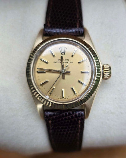 Rolex Oyster Perpetual 24MM Champagne Dial Leather Strap (6719)