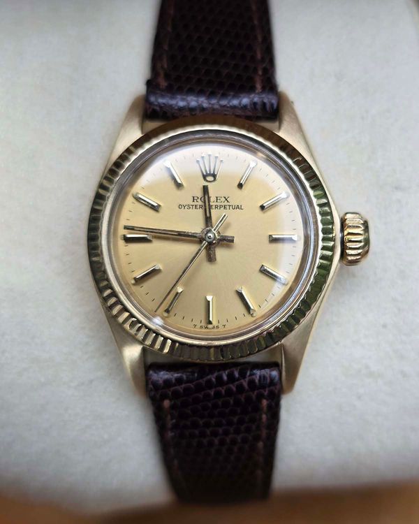Rolex Oyster Perpetual 24MM Champagne Dial Leather Strap (6719)