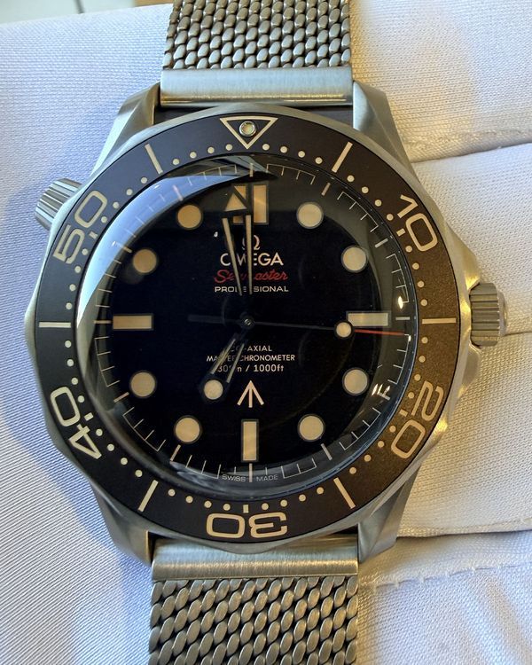 2026 Omega Seamaster Diver 300M 007 Edition 42MM Brown Dial Titanium Bracelet (210.90.42.20.01.001)