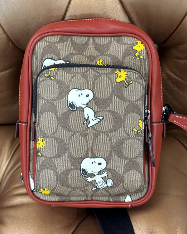 Coach Bag x Peanuts Track Pack L.E. 14IN Signature Coated Canvas With Snoopy Woodstock Print Leather Silver-Tone Hardware Textile Strap (CE600)