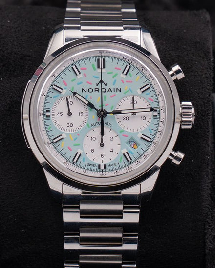 2026 Norqain Freedom Chrono Enjoy Life "Sprinkles" 40MM Blue Dial Steel Bracelet (N2201.19S04.A01)