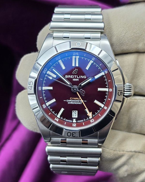 Breitling Chronomat GMT Six Nations Wales 40MM Burgundy Dial Steel Bracelet (A323988B1K1A1)