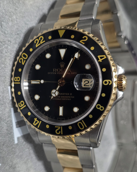1999 Rolex GMT-Master II 40MM Black Dial Two-Tone Oyster Bracelet (116713LN)