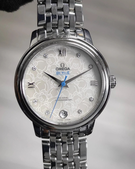 Omega De Ville Prestige "Orbis" 32.7MM Mother of Pearl Dial Steel Bracelet (424.10.33.20.55.004)