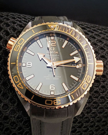 2017 Omega Seamaster Planet Ocean 600M "Deep Black" Gold Bezel 45.5MM Black Dial Leather Strap (215.63.46.22.01.001)