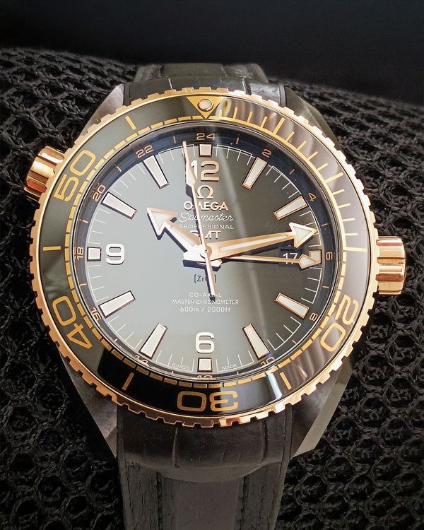 2017 Omega Seamaster Planet Ocean 600M "Deep Black" Gold Bezel 45.5MM Black Dial Leather Strap (215.63.46.22.01.001)
