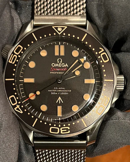 2024 Omega Seamaster Diver 300M "007 Edition" S.E. 42MM Brown Dial Titanium Bracelet (210.90.42.20.01.001)