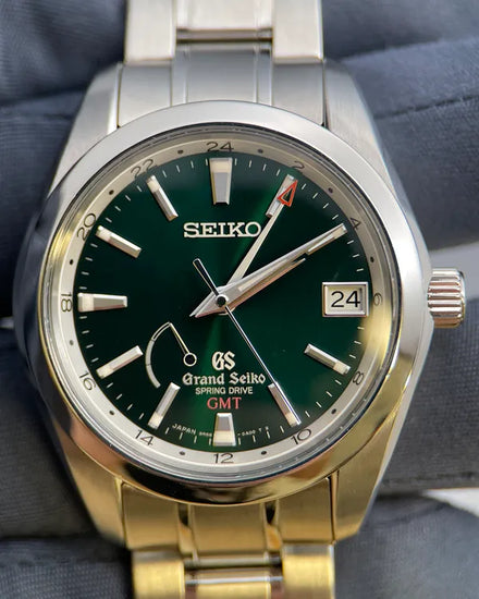 2016 Grand Seiko Spring Drive GMT 55th Anniversary L.E. 41MM Green Dial Steel Bracelet (SBGE033G)