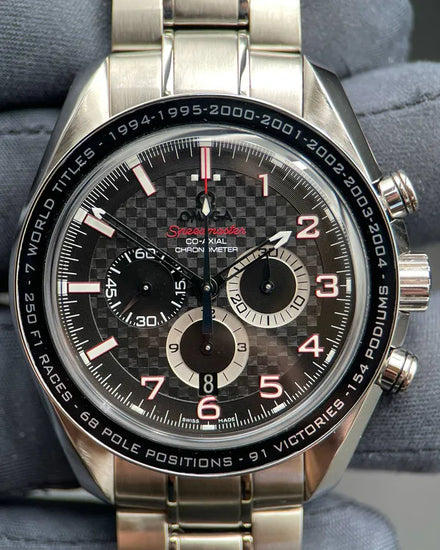 2009 Omega Speedmaster "Michael Schumacher The Legend" 44.25MM Carbon Fiber Dial Steel Bracelet (321.30.44.50.01.001)