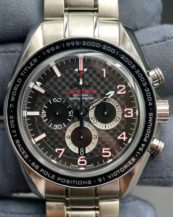 2009 Omega Speedmaster "Michael Schumacher The Legend" 44.25MM Carbon Fiber Dial Steel Bracelet (321.30.44.50.01.001)