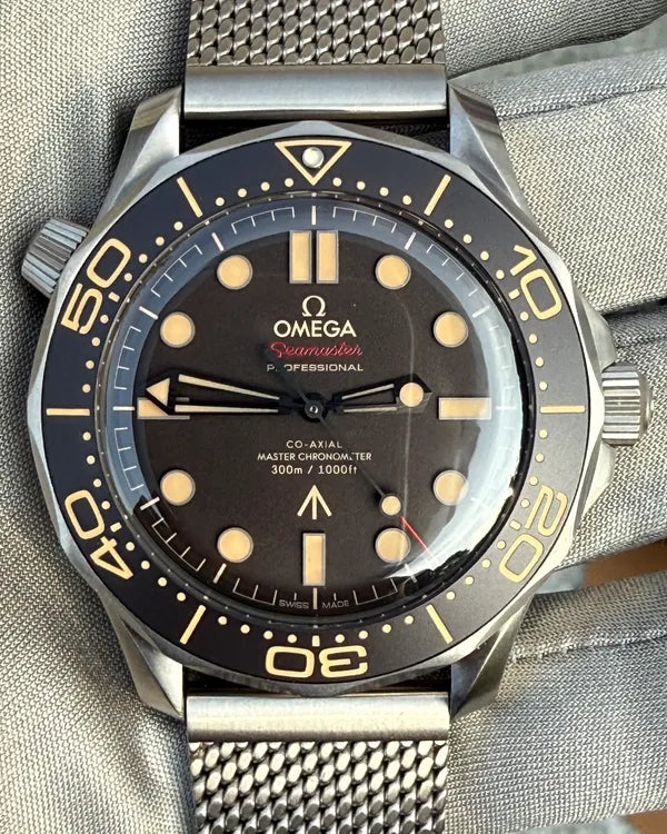 2025 Omega Seamaster Diver 300M "007 Edition" 42MM Brown Dial Titanium Bracelet (210.90.42.20.01.001)