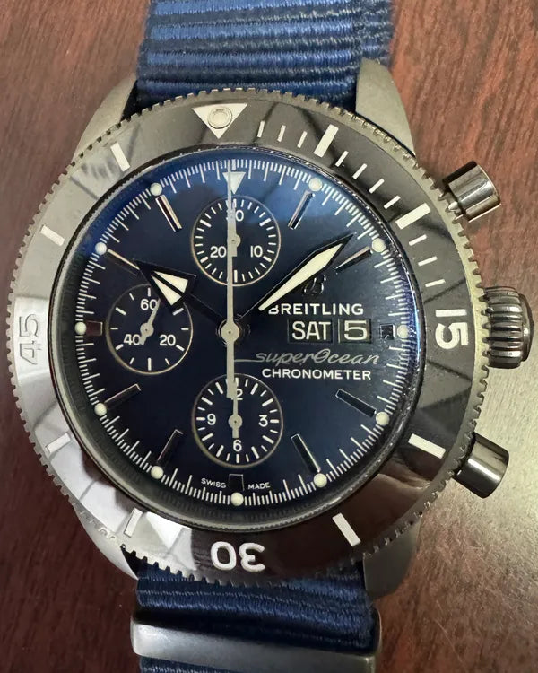 Breitling Superocean Heritage II Chronograph "Outerknown" 44MM Blue Dial Textile Strap (M133132A1C1W1)