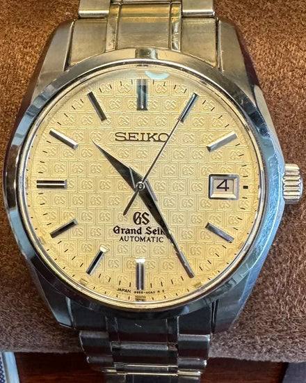 2003 Grand Seiko Historical Mechanical 37MM Cream Dial Titanium Bracelet (SBGR025)