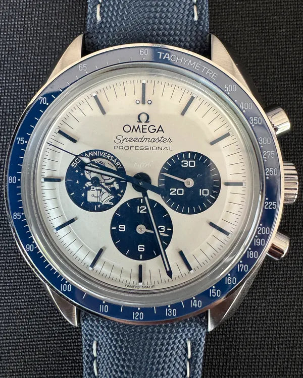 Omega Speedmaster Anniversary Series "Silver Snoopy Award" 42MM Silver Dial Textile Strap (310.32.42.50.02.001)