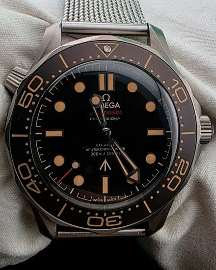 Omega Seamaster Diver 300M "007 Edition" 42MM Brown Dial Titanium Bracelet (210.90.42.20.01.001)